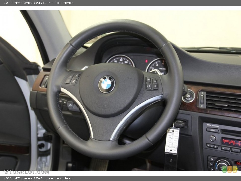 Black Interior Steering Wheel for the 2011 BMW 3 Series 335i Coupe #79649615