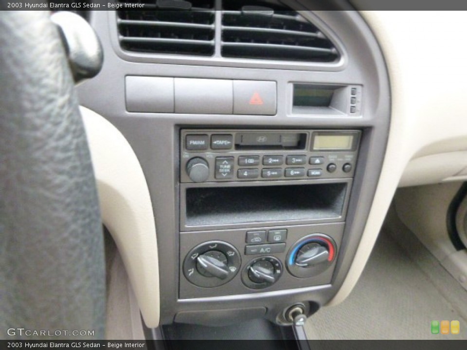 Beige Interior Controls for the 2003 Hyundai Elantra GLS Sedan #79663159