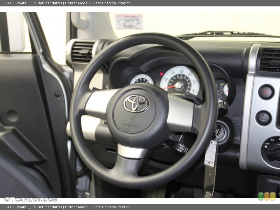 Dark Charcoal Interior Steering Wheel for the 2010 Toyota FJ Cruiser  #79663876