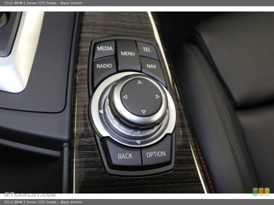 Black Interior Controls for the 2013 BMW 3 Series 335i Sedan #79670409