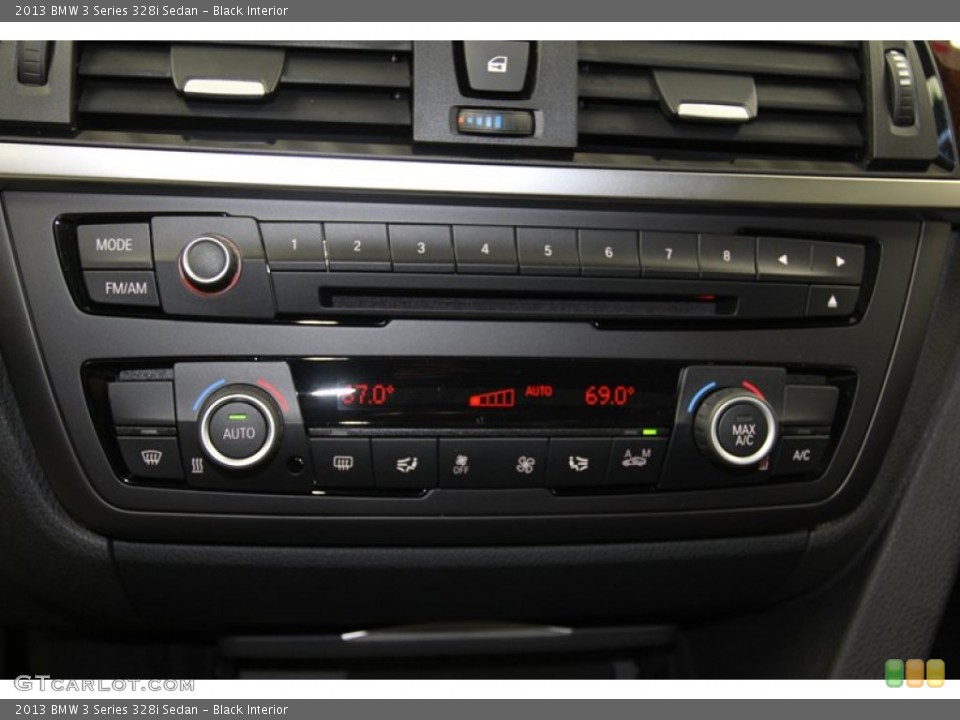 Black Interior Controls for the 2013 BMW 3 Series 328i Sedan #79671222