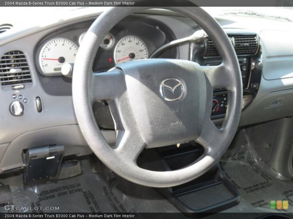 Medium Dark Flint Interior Steering Wheel for the 2004 Mazda B-Series Truck B3000 Cab Plus #79688731