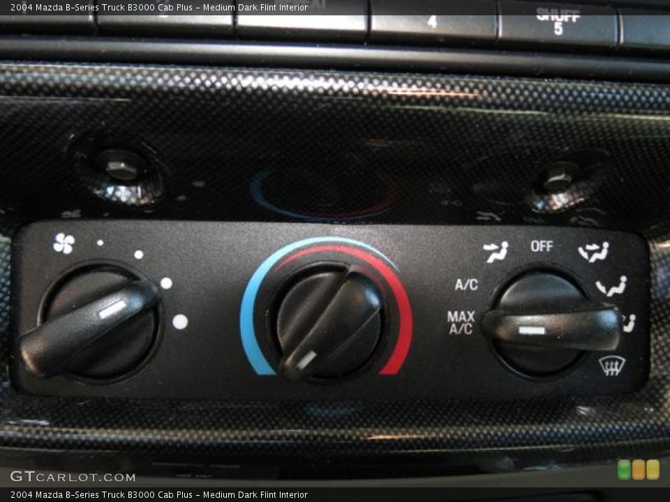 Medium Dark Flint Interior Controls for the 2004 Mazda B-Series Truck B3000 Cab Plus #79688887