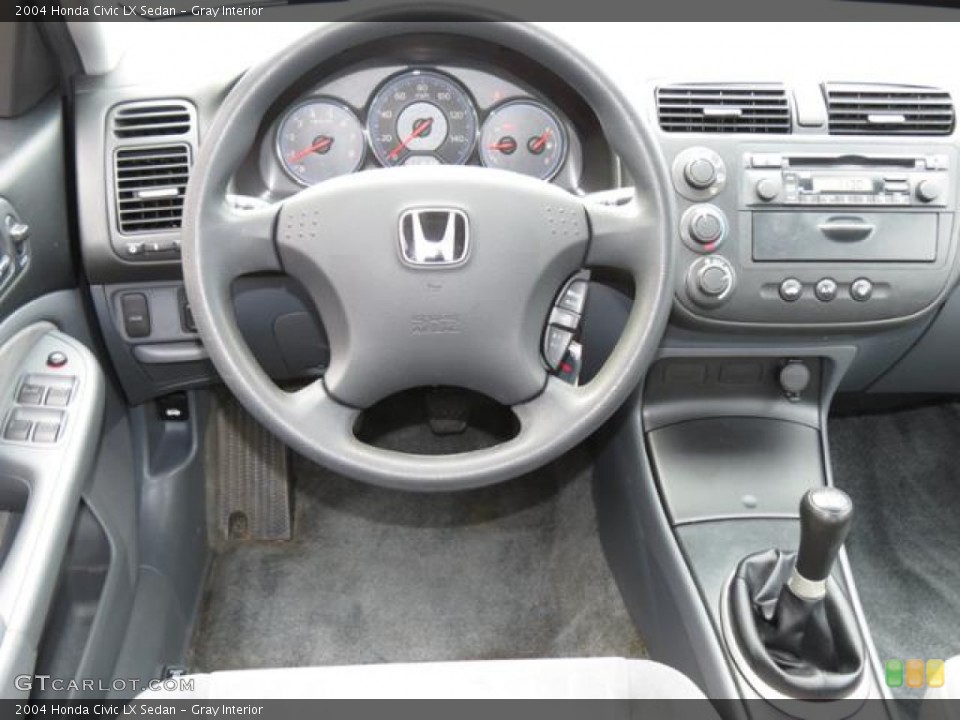 Gray Interior Dashboard for the 2004 Honda Civic LX Sedan #79689208