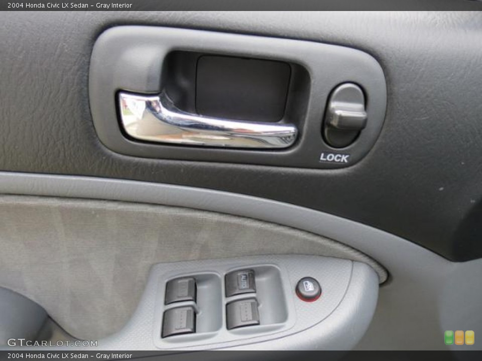 Gray Interior Controls for the 2004 Honda Civic LX Sedan #79689301