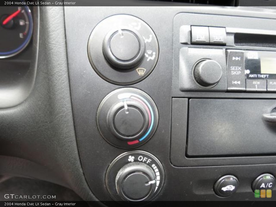 Gray Interior Controls for the 2004 Honda Civic LX Sedan #79689349