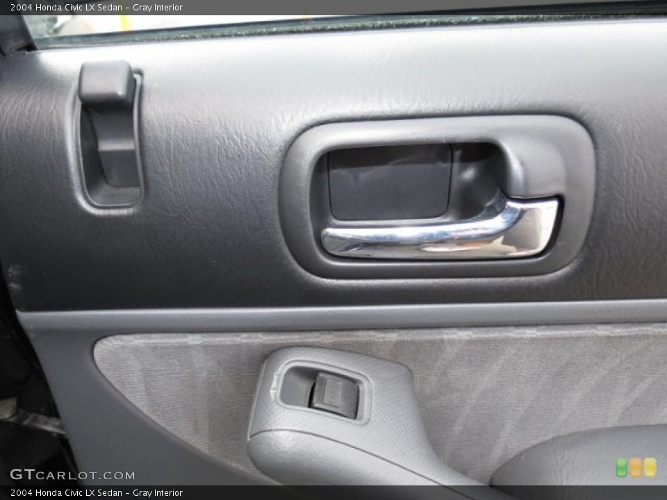 Gray Interior Controls for the 2004 Honda Civic LX Sedan #79689508
