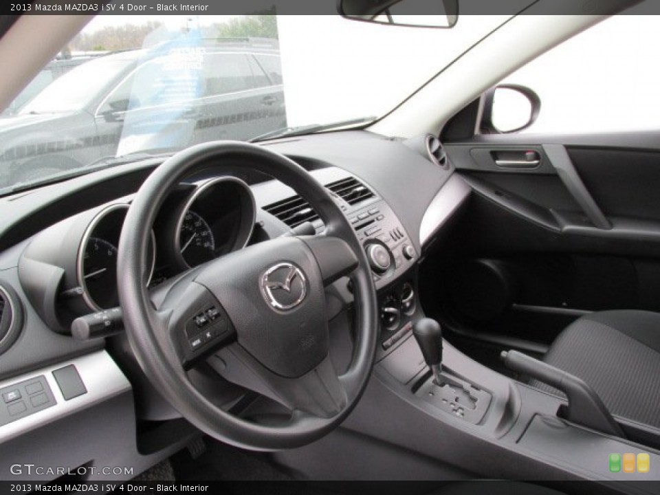 Black Interior Dashboard for the 2013 Mazda MAZDA3 i SV 4 Door #79698742