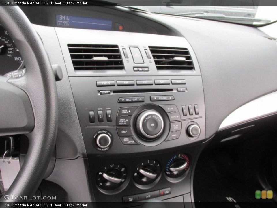 Black Interior Controls for the 2013 Mazda MAZDA3 i SV 4 Door #79698781