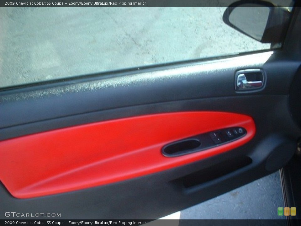 Ebony/Ebony UltraLux/Red Pipping Interior Door Panel for the 2009 Chevrolet Cobalt SS Coupe #79753155