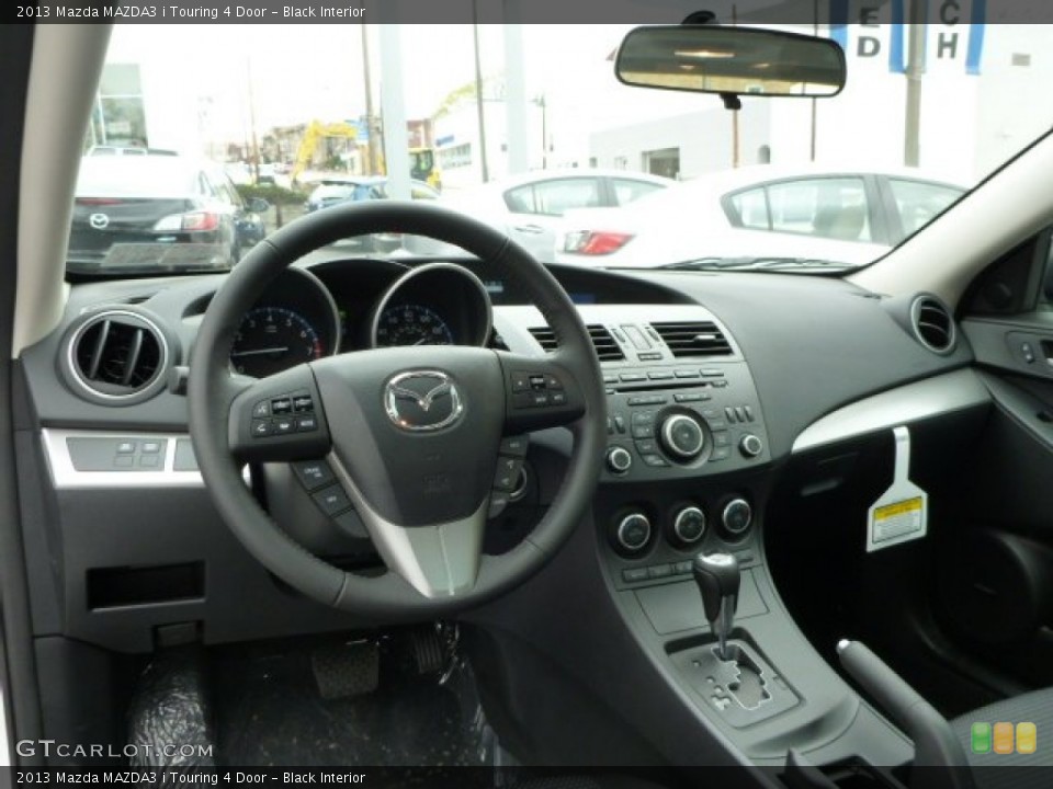 Black Interior Dashboard for the 2013 Mazda MAZDA3 i Touring 4 Door #79753394