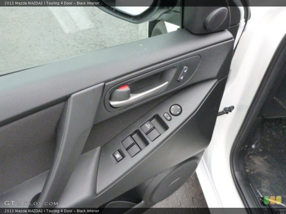 Black Interior Controls for the 2013 Mazda MAZDA3 i Touring 4 Door #79753433