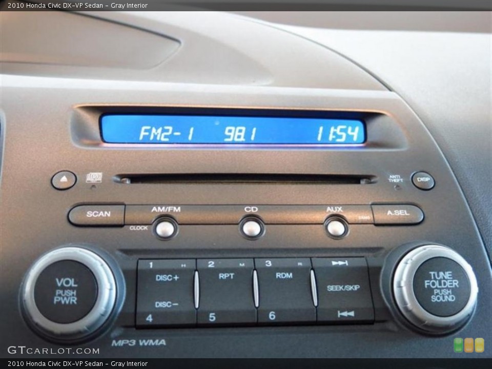 Gray Interior Controls for the 2010 Honda Civic DX-VP Sedan #79763984