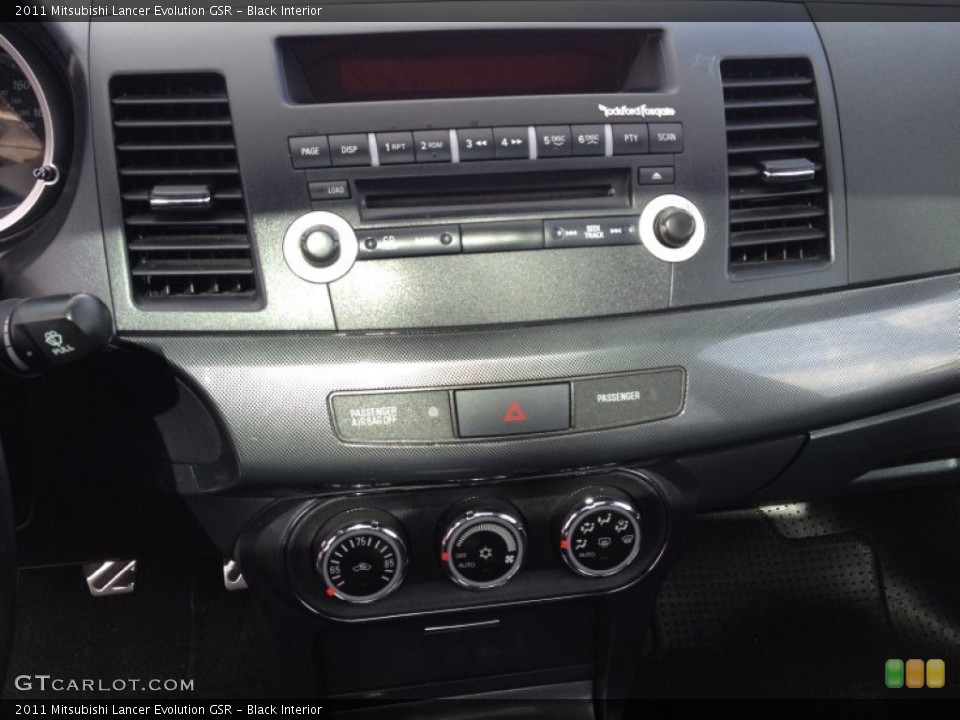 Black Interior Controls for the 2011 Mitsubishi Lancer Evolution GSR #79783728