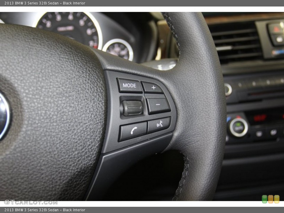 Black Interior Controls for the 2013 BMW 3 Series 328i Sedan #79808896