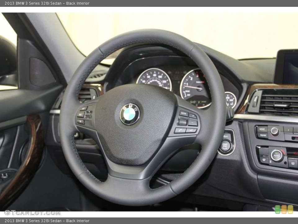 Black Interior Steering Wheel for the 2013 BMW 3 Series 328i Sedan #79808936