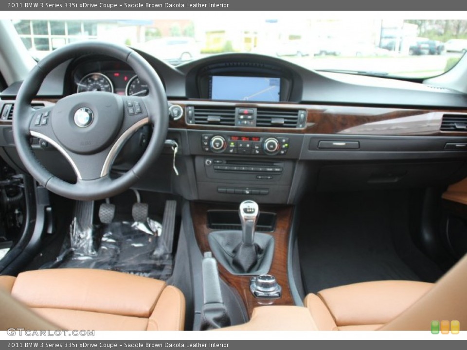 Saddle Brown Dakota Leather Interior Dashboard for the 2011 BMW 3 Series 335i xDrive Coupe #79830980