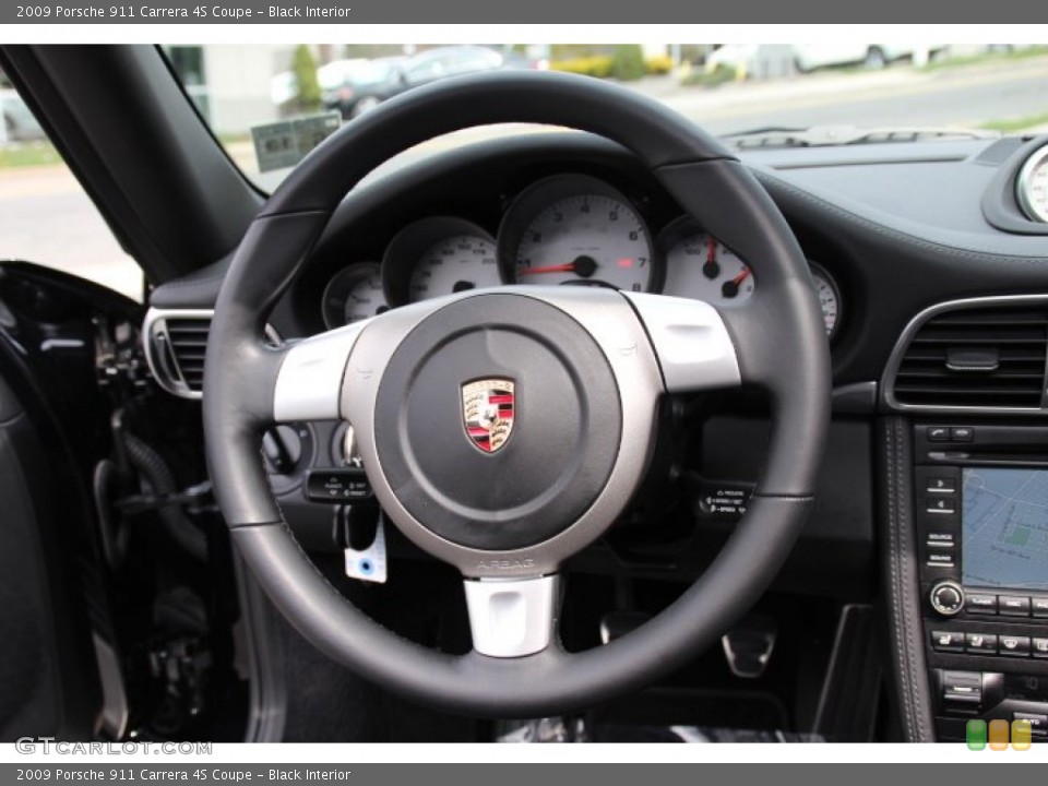 Black Interior Steering Wheel for the 2009 Porsche 911 Carrera 4S Coupe #79834402