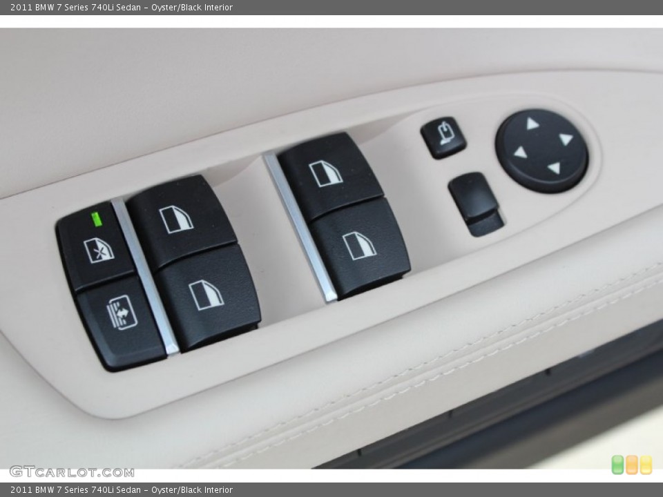 Oyster/Black Interior Controls for the 2011 BMW 7 Series 740Li Sedan #79845884