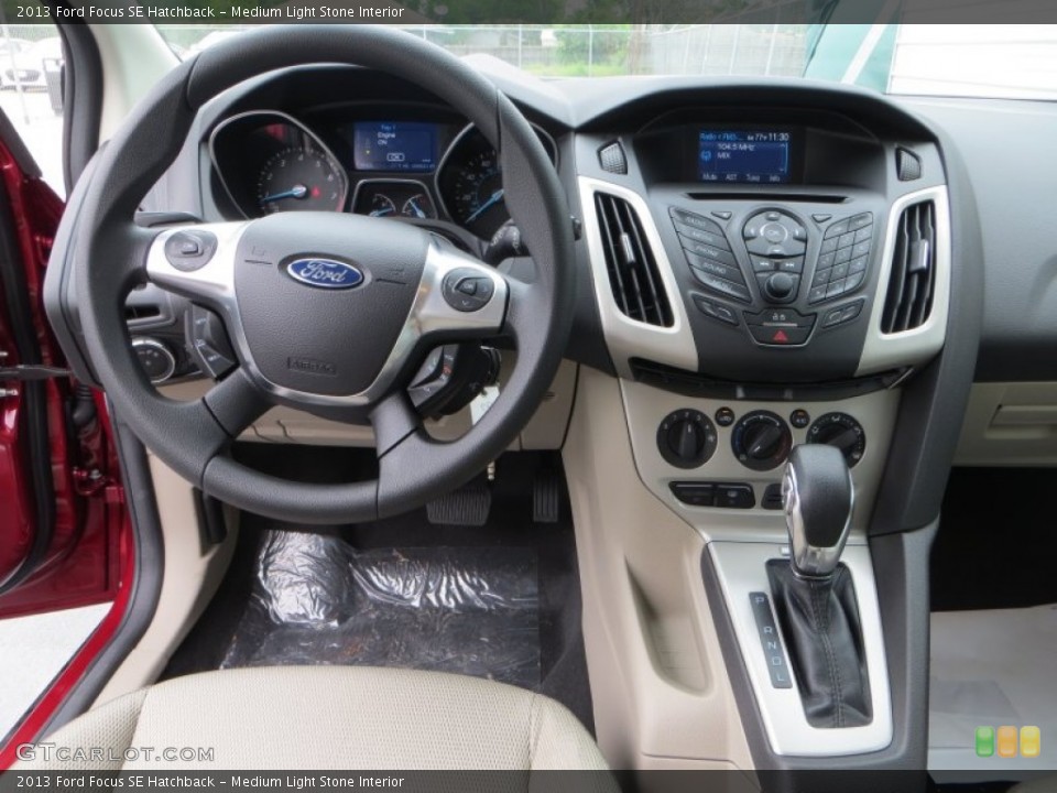 Medium Light Stone Interior Dashboard for the 2013 Ford Focus SE Hatchback #79899199