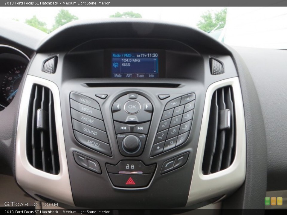 Medium Light Stone Interior Controls for the 2013 Ford Focus SE Hatchback #79899222