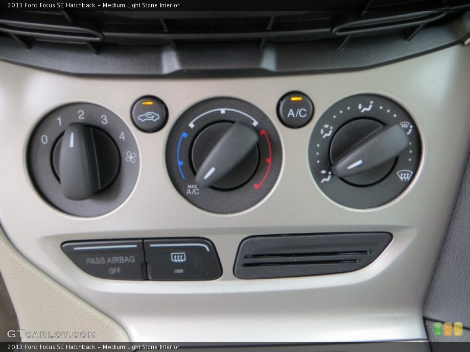 Medium Light Stone Interior Controls for the 2013 Ford Focus SE Hatchback #79899244