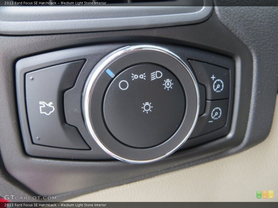 Medium Light Stone Interior Controls for the 2013 Ford Focus SE Hatchback #79899327