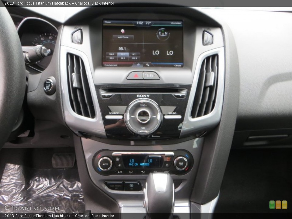 Charcoal Black Interior Controls for the 2013 Ford Focus Titanium Hatchback #79899892