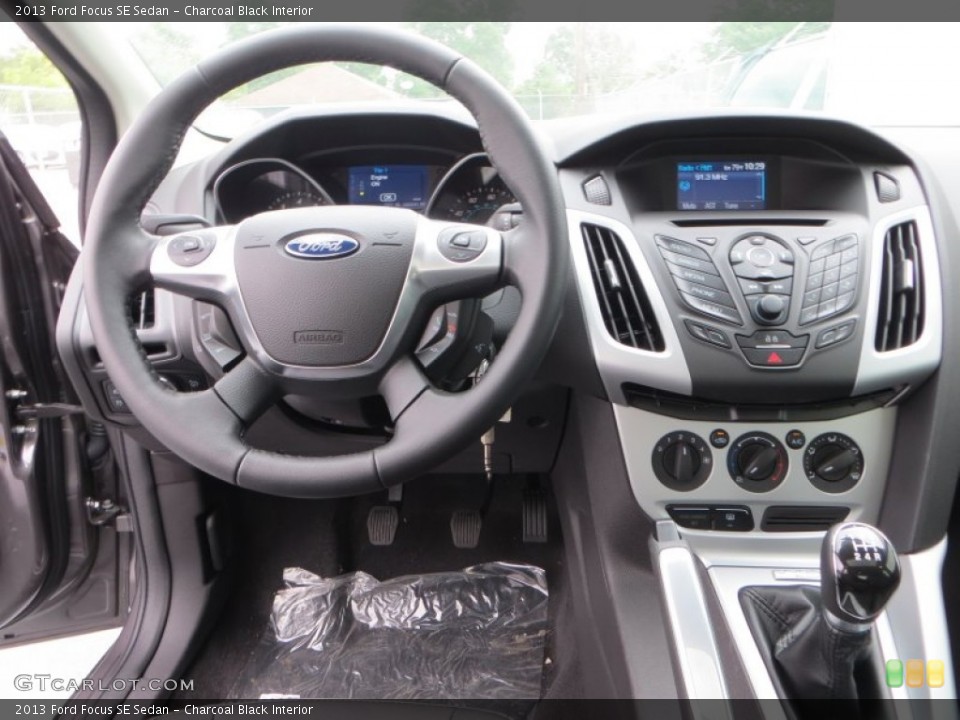 Charcoal Black Interior Dashboard for the 2013 Ford Focus SE Sedan #79900566