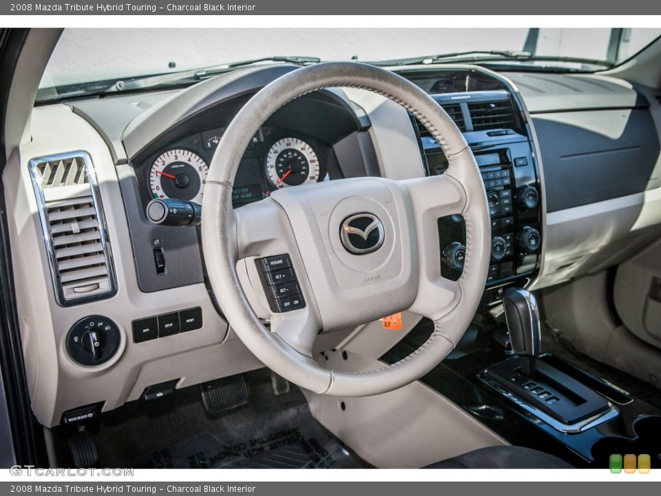 Charcoal Black Interior Dashboard for the 2008 Mazda Tribute Hybrid Touring #79929991