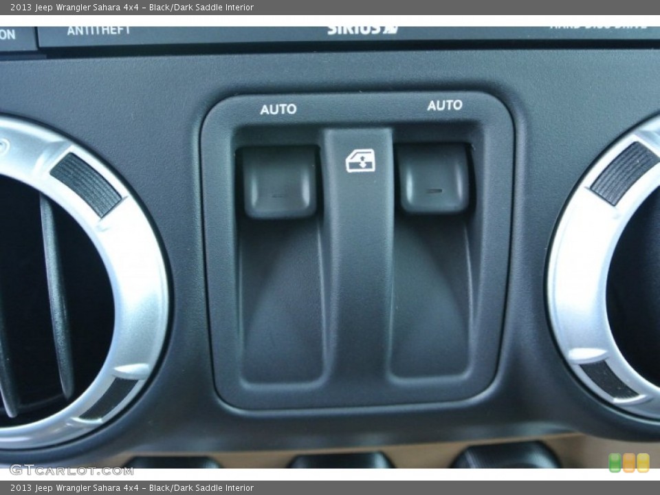 Black/Dark Saddle Interior Controls for the 2013 Jeep Wrangler Sahara 4x4 #79958851