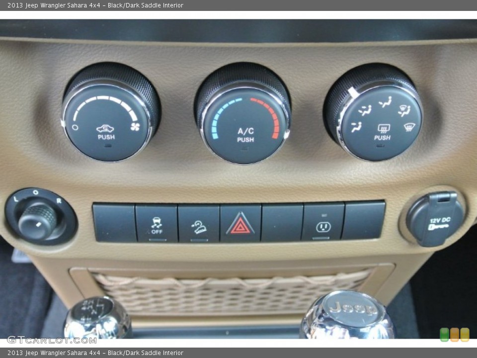 Black/Dark Saddle Interior Controls for the 2013 Jeep Wrangler Sahara 4x4 #79959348