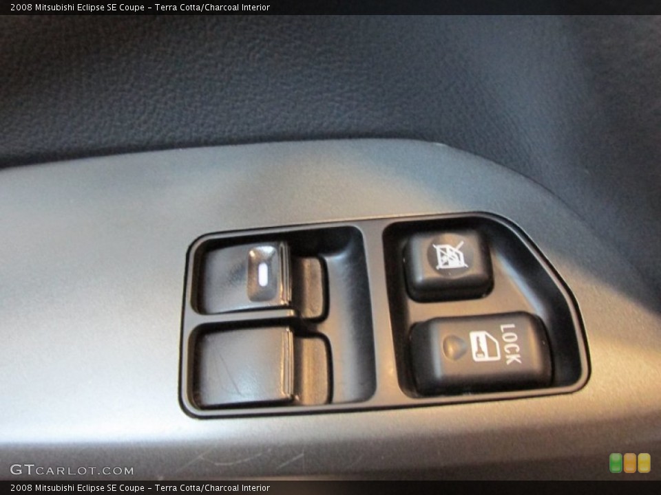 Terra Cotta/Charcoal Interior Controls for the 2008 Mitsubishi Eclipse SE Coupe #79960955