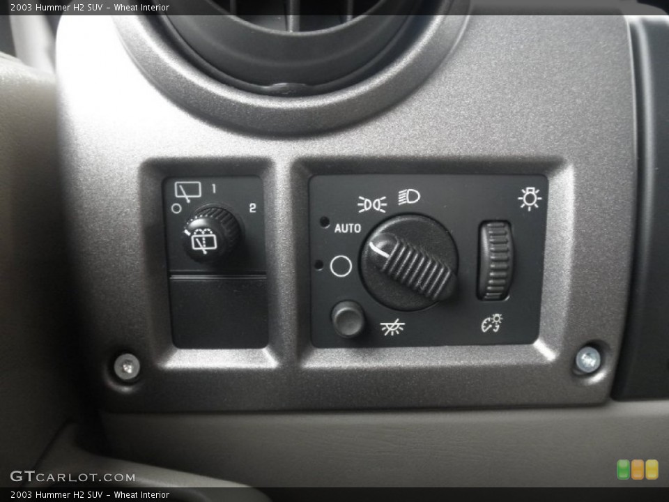 Wheat Interior Controls for the 2003 Hummer H2 SUV #79961587