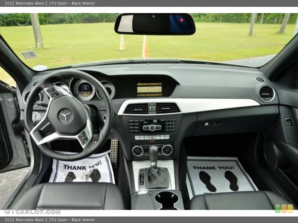 Black Interior Dashboard for the 2012 Mercedes-Benz C 250 Sport #79971629
