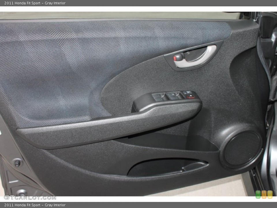 Gray Interior Door Panel for the 2011 Honda Fit Sport #79971854