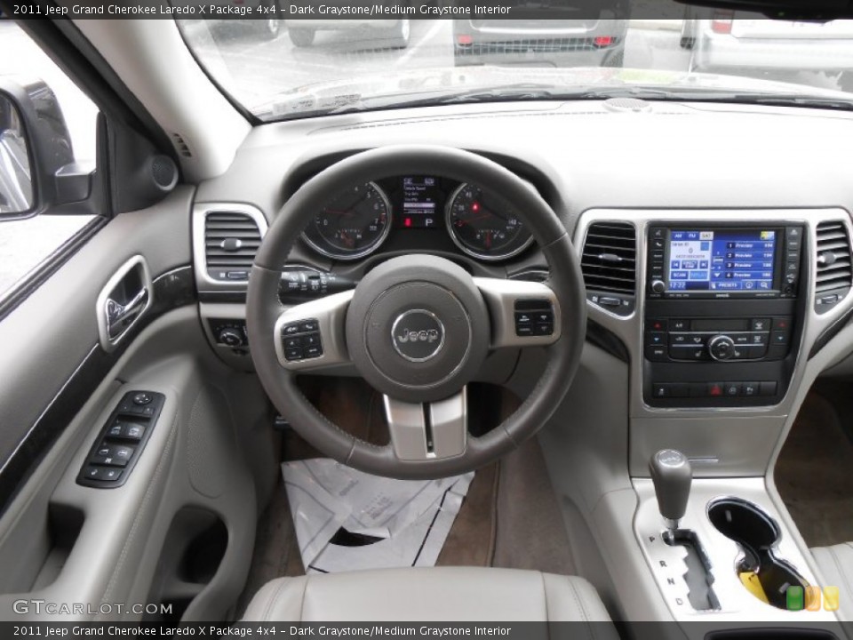 Dark Graystone/Medium Graystone Interior Dashboard for the 2011 Jeep Grand Cherokee Laredo X Package 4x4 #79977554