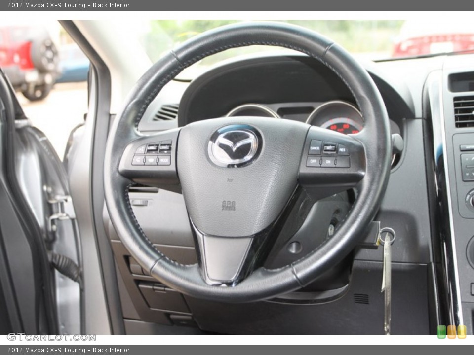 Black Interior Steering Wheel for the 2012 Mazda CX-9 Touring #79999128