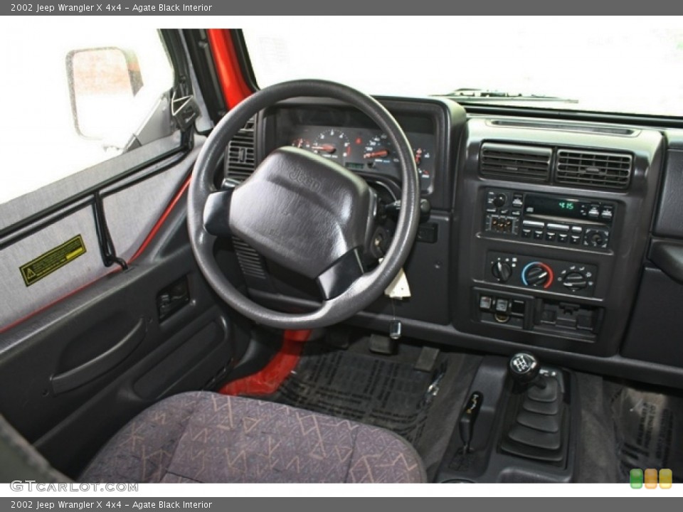 Agate Black Interior Dashboard for the 2002 Jeep Wrangler X 4x4 #80044523