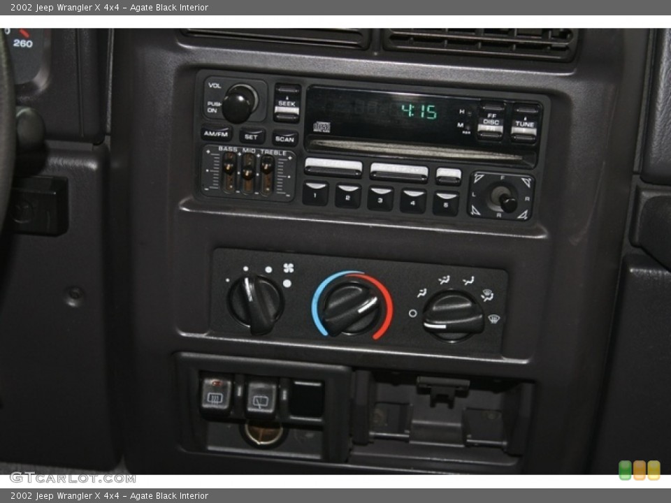Agate Black Interior Controls for the 2002 Jeep Wrangler X 4x4 #80044535
