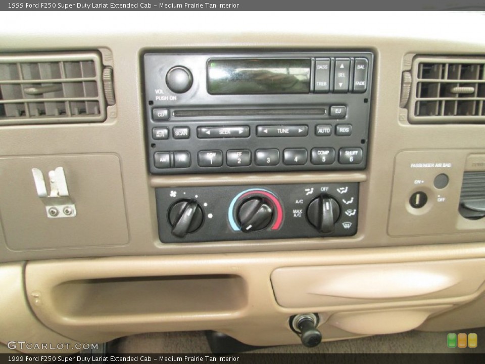 Medium Prairie Tan Interior Controls for the 1999 Ford F250 Super Duty Lariat Extended Cab #80087505