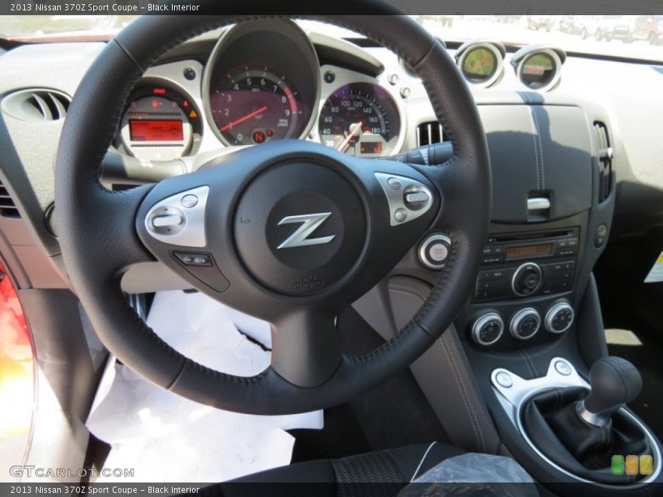 Black Interior Steering Wheel for the 2013 Nissan 370Z Sport Coupe #80120289