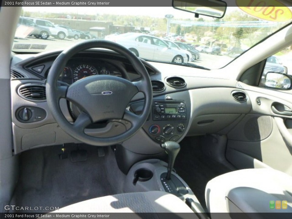 Medium Graphite Grey Interior Dashboard for the 2001 Ford Focus SE Sedan #80147872