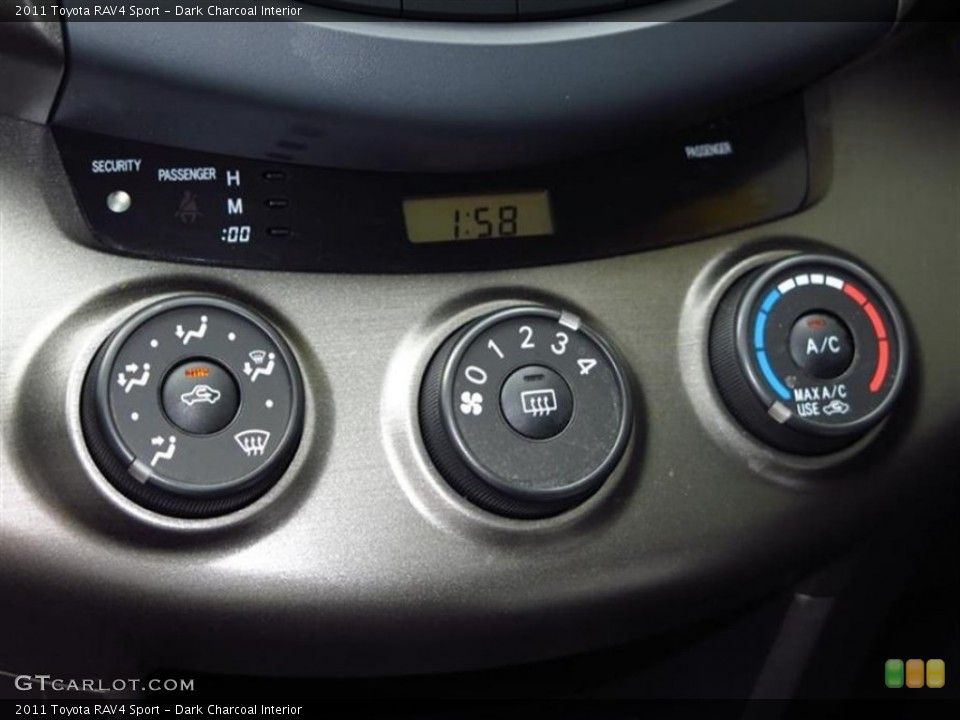 Dark Charcoal Interior Controls for the 2011 Toyota RAV4 Sport #80154606