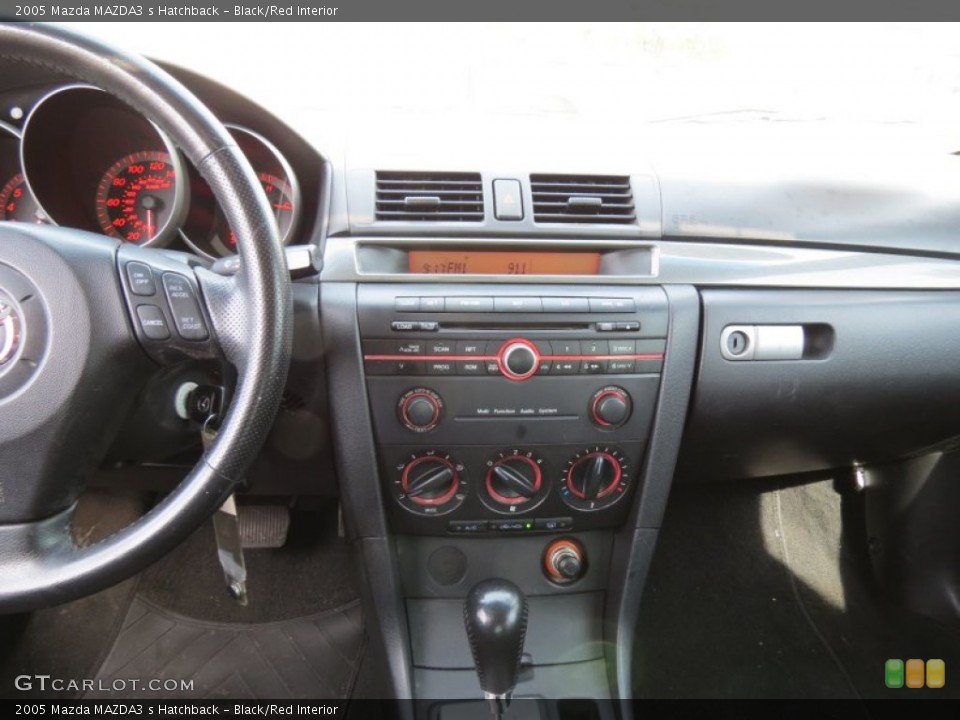 Black/Red Interior Controls for the 2005 Mazda MAZDA3 s Hatchback #80185126