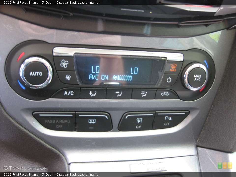 Charcoal Black Leather Interior Controls for the 2012 Ford Focus Titanium 5-Door #80199614
