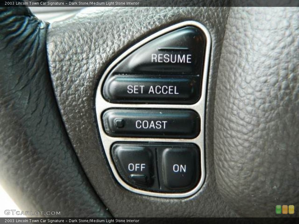 Dark Stone/Medium Light Stone Interior Controls for the 2003 Lincoln Town Car Signature #80208884