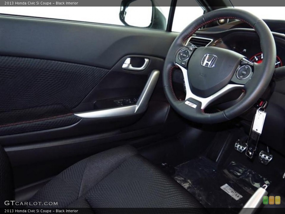 Black Interior Steering Wheel for the 2013 Honda Civic Si Coupe #80239276