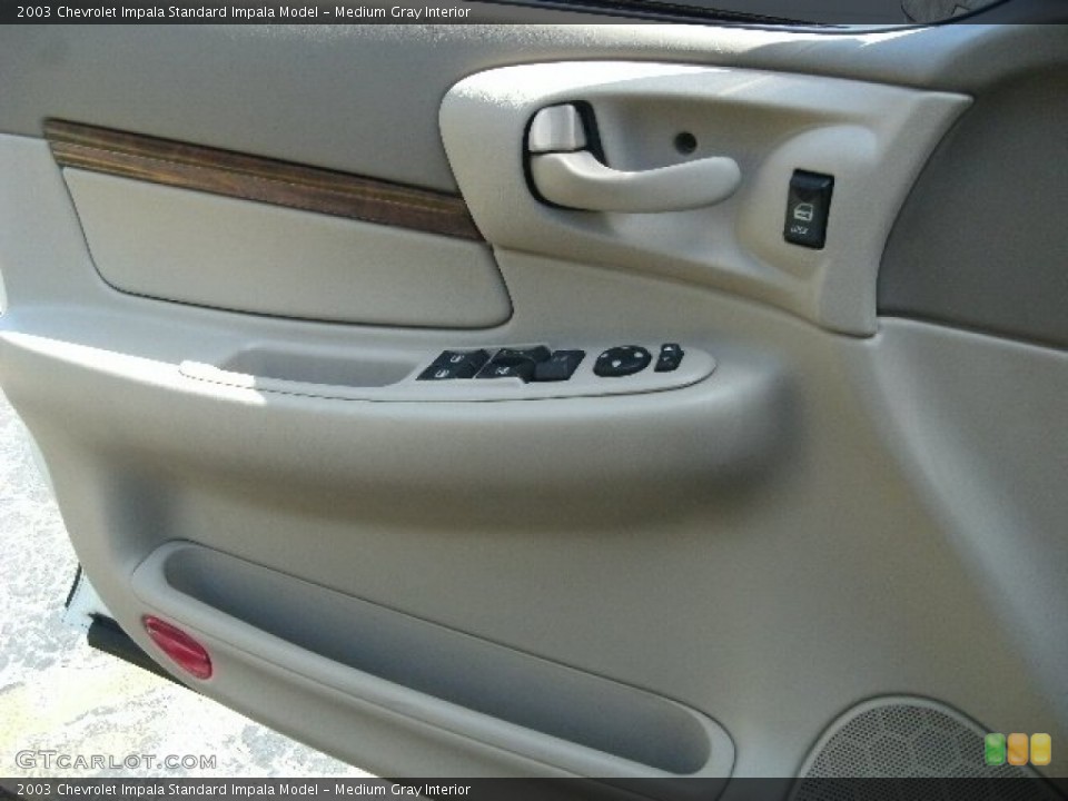 Medium Gray Interior Door Panel for the 2003 Chevrolet Impala  #80267115