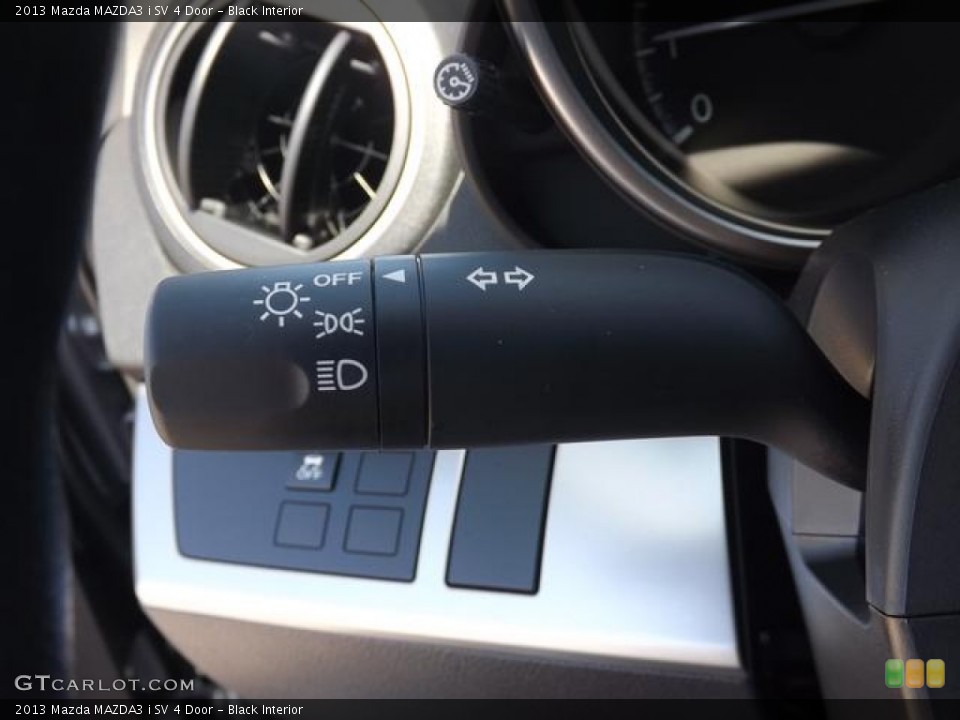 Black Interior Controls for the 2013 Mazda MAZDA3 i SV 4 Door #80292503